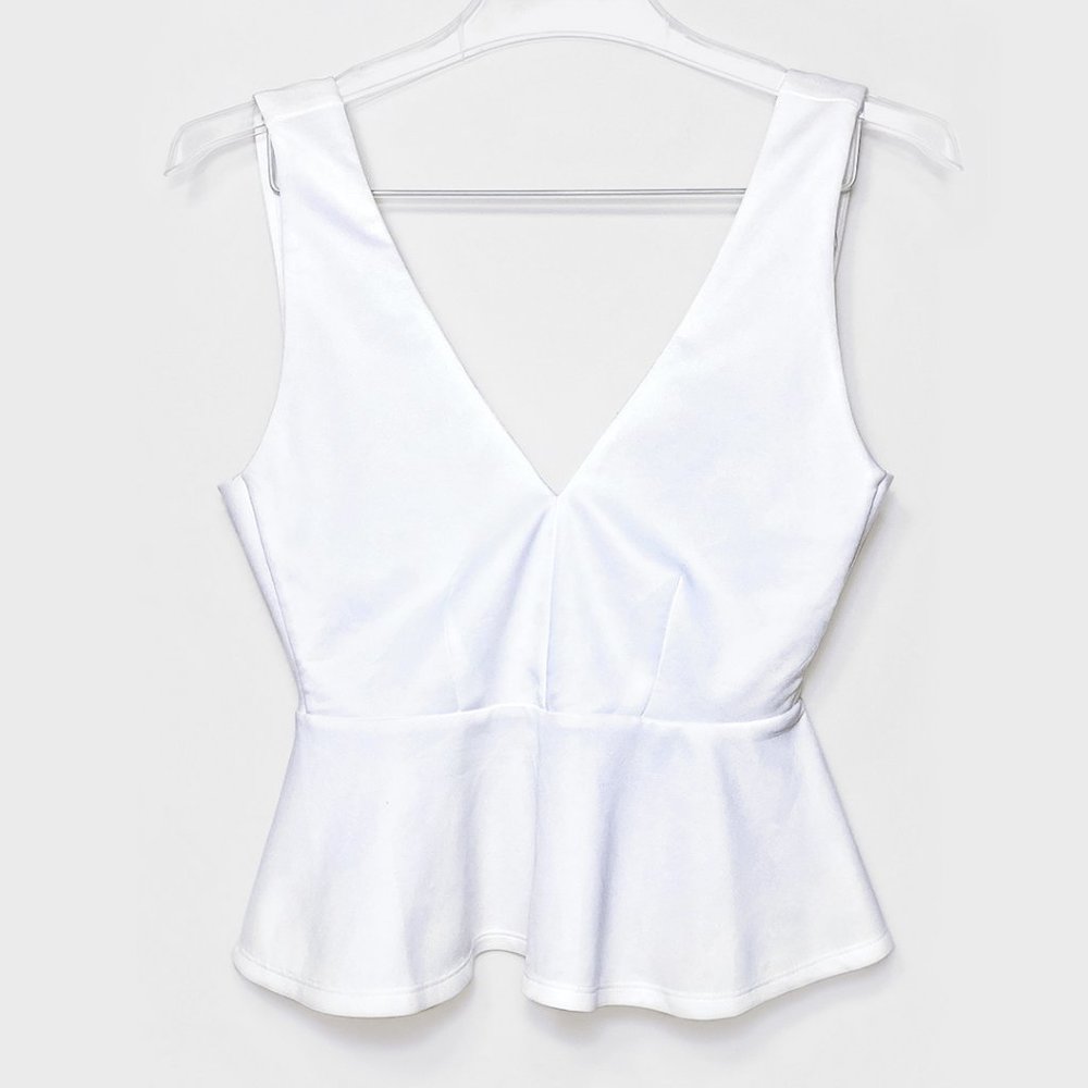 White Sleeveless V-Neck Peplum Top by Forever21